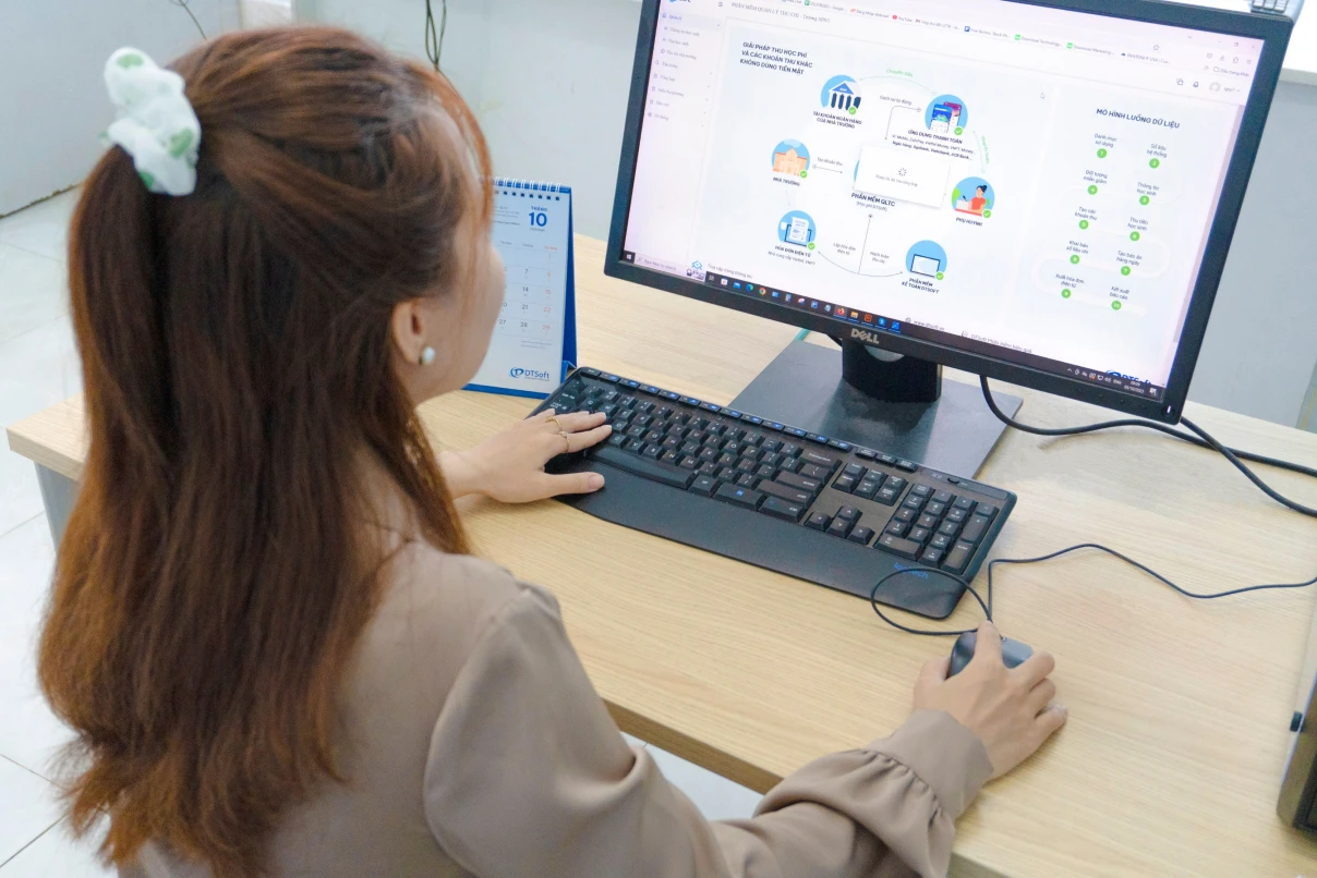 Woman setting up accounting system integrations.